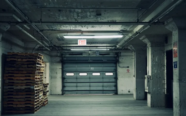Industrial sectional garage door inside a concrete building
