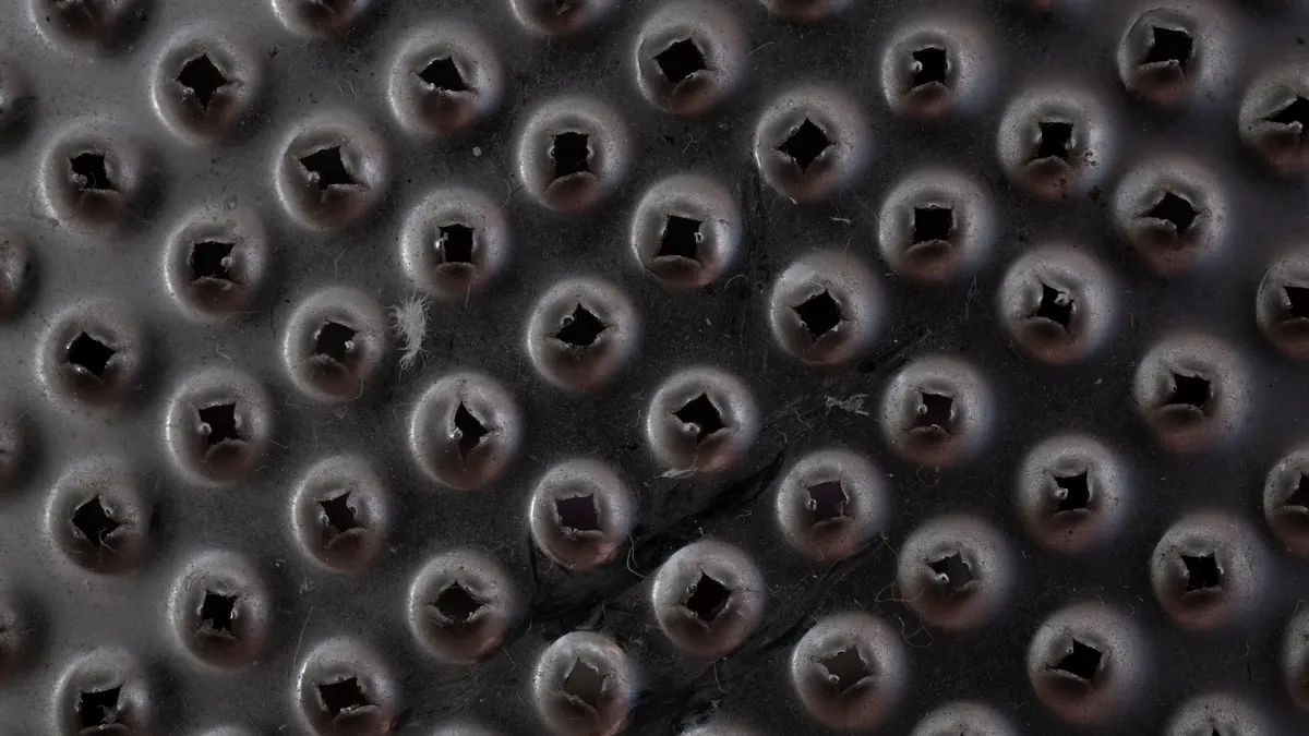 Close-up of a rubber mat with a raised coin pattern