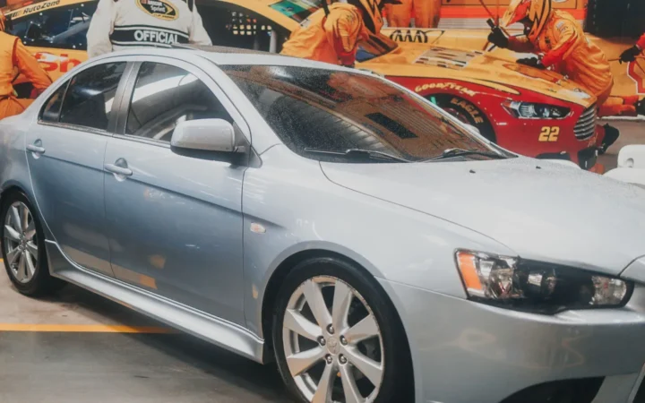 Silver car parked inside a garage