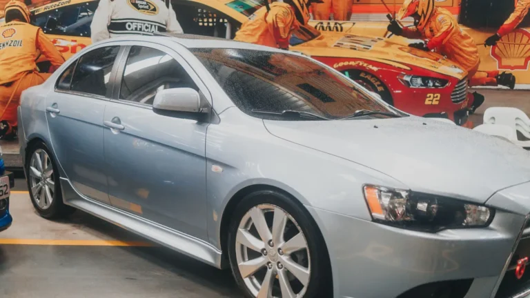 Silver car parked inside a garage