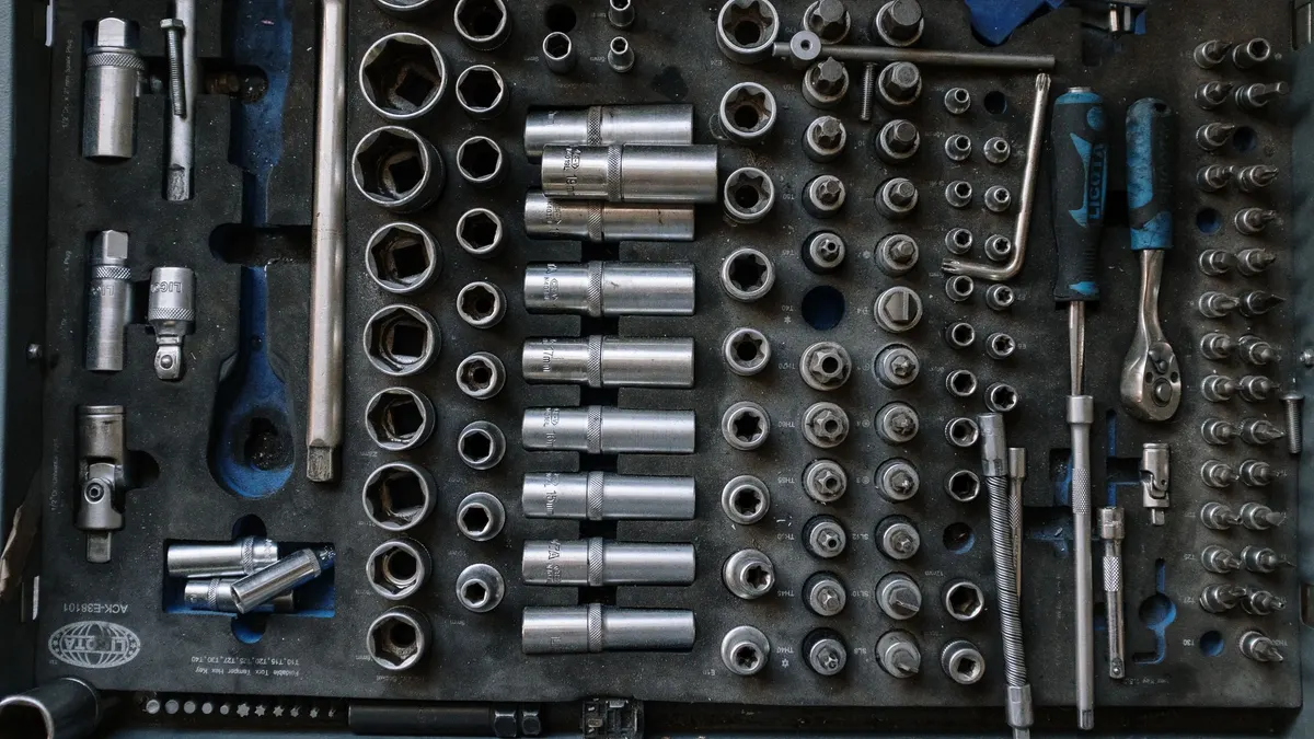 Sockets and ratchets organized in a foam drawer insert