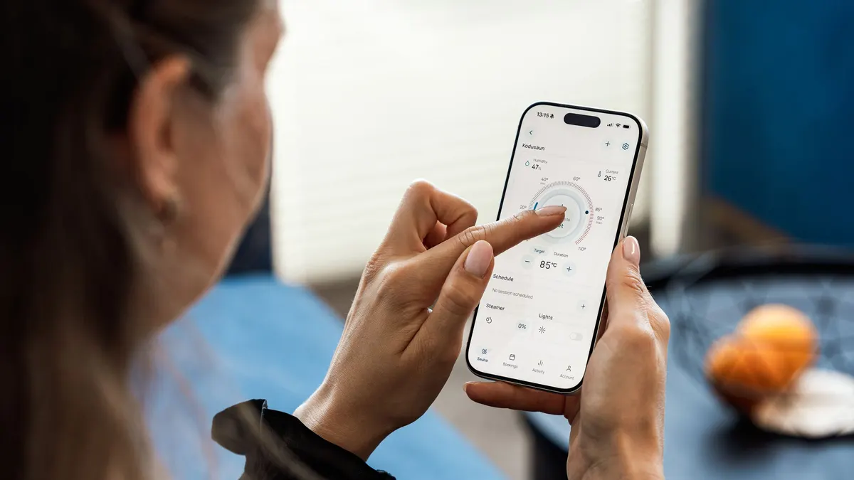Person using a smartphone app at home